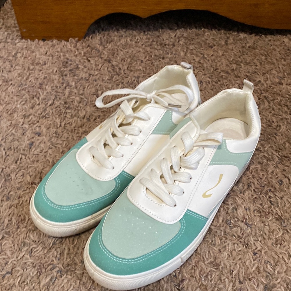 Cream and green sneakers